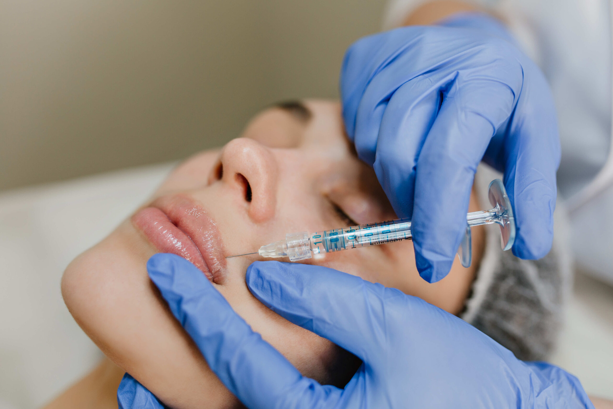 closeup-portrait-injection-on-lips-of-pretty-woman-2026-01-05-01-18-14-utc